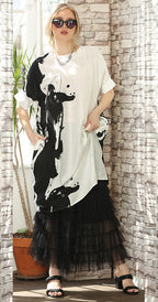 T2632  oversized tunic with a bold black and white abstract print.