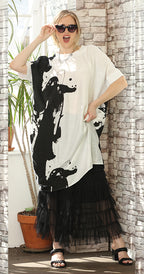 T2632  oversized tunic with a bold black and white abstract print.
