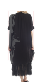 T2632  oversized tunic with a bold black and white abstract print.