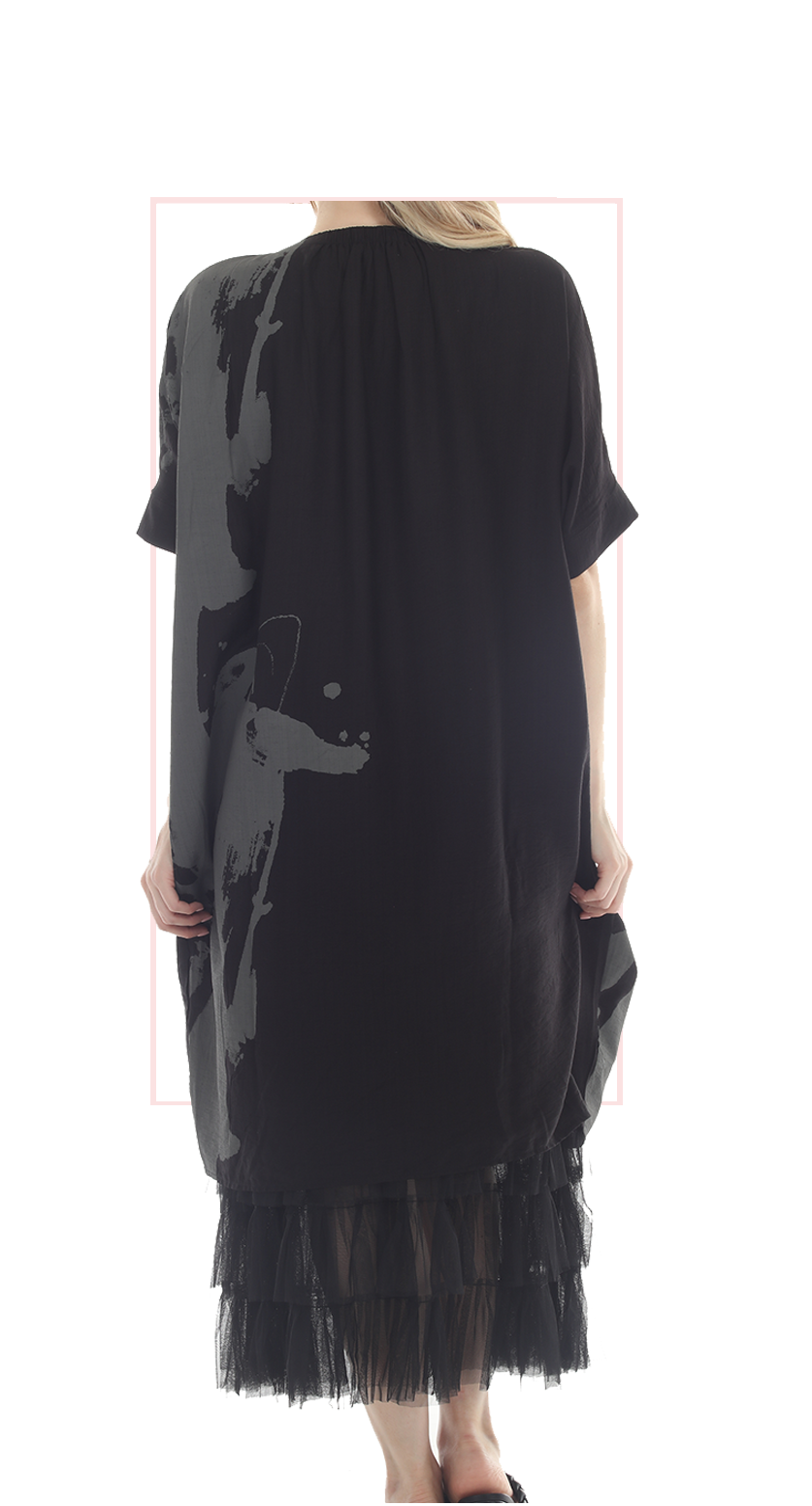 T2632  oversized tunic with a bold black and white abstract print.
