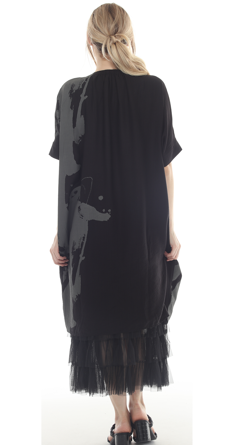 T2632  oversized tunic with a bold black and white abstract print.