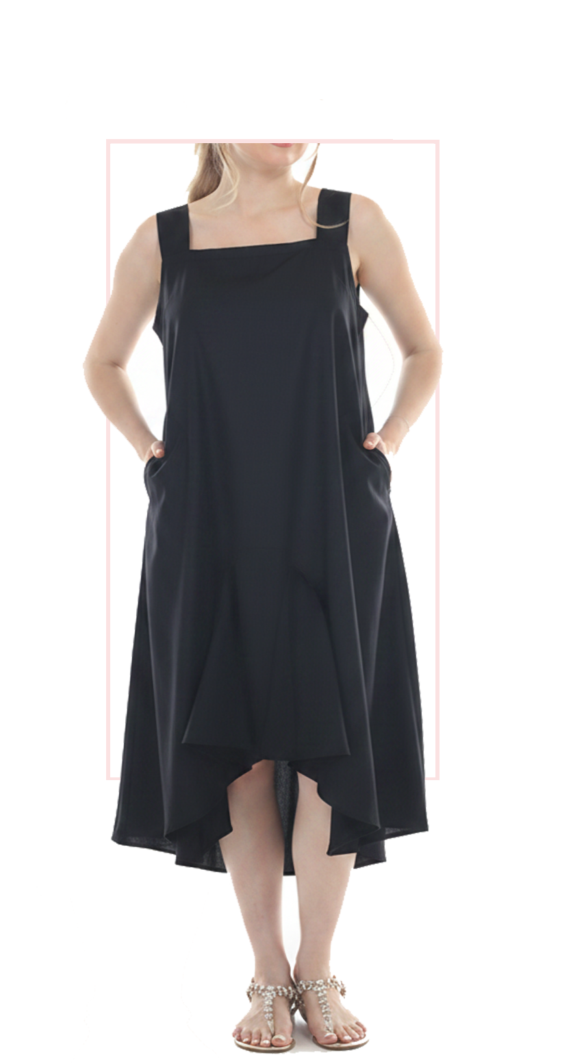 Woman wearing TERRA black pinafore jumper dress, front view