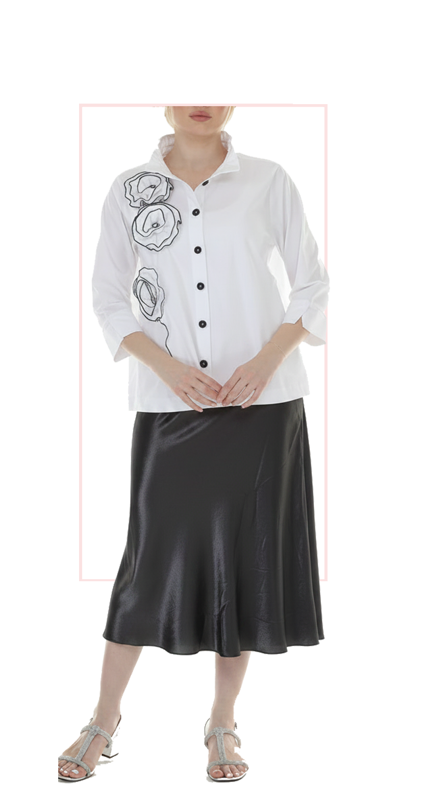 Woman wearing TERRA black satin A-line maxi skirt, front view