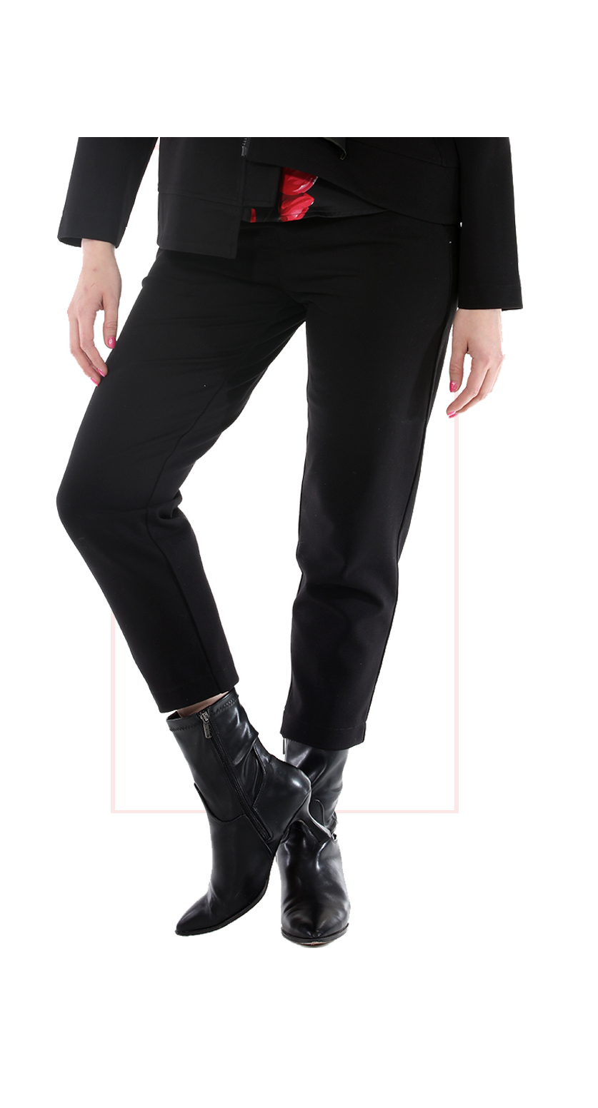 Woman wearing TERRA black high-rise wide-leg trousers with a flowing silhouette front view