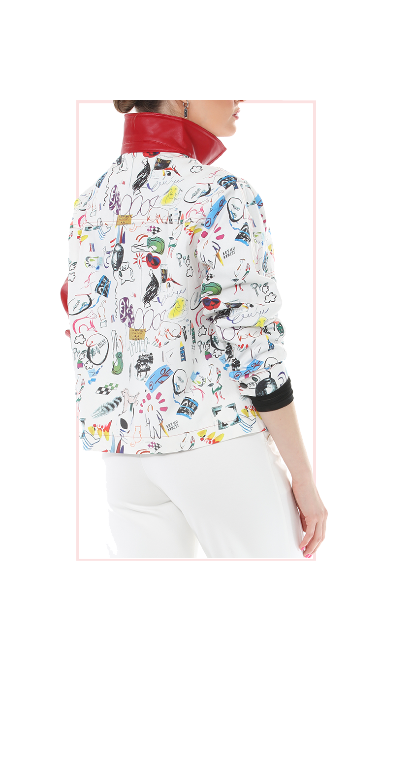 woman wearing a patterned leather jacket with a white shirt on a white background